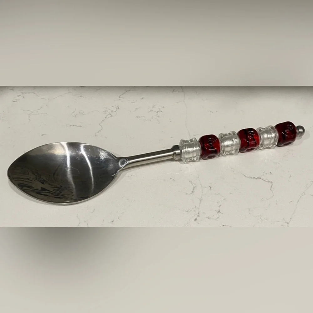 The Pampered Chef Stainless Steel Spoon with Red Accents